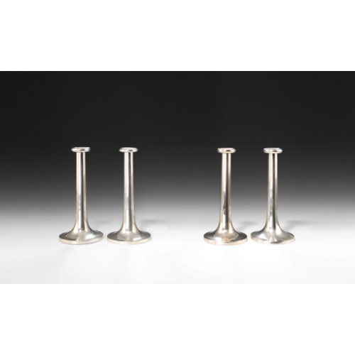 FOUR CANDLESTICKS